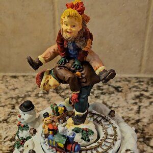 Christmas wind-up music train - Berkeley Designs rotating figure.